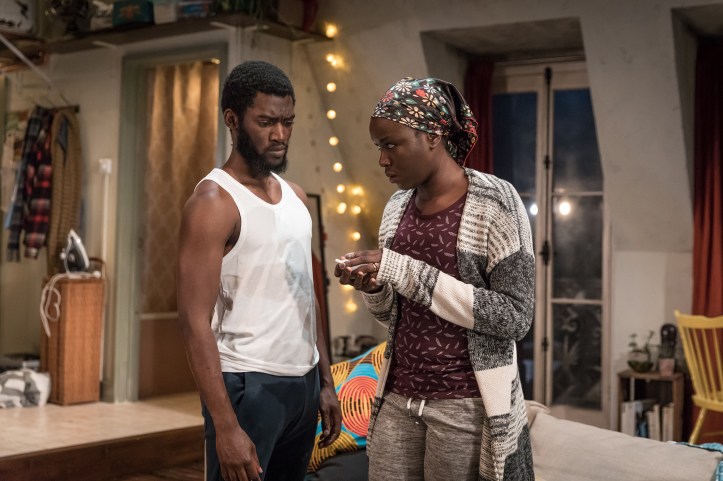 Malachi Kirby (Alioune) & Faith Alabi (Amina) in Belleville at the Donmar, directed by Michael Longhurst, designed by Tom Scutt. Photo by Marc Brenner